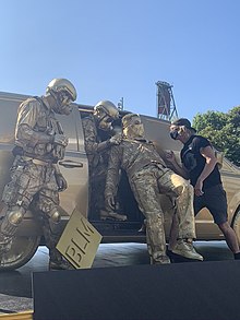 Buckley positions performers for the Ode To Putin statue in Waterfront Park, August 3rd 2020 Ode to Putin .jpg