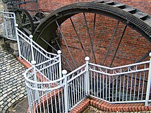 The suspension wheel with rim-gearing at the Portland Basin Canal Warehouse Portland Basin waterwheel- 5185.JPG