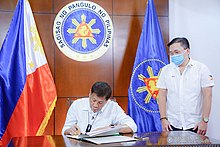 Duterte signs into law the establishment of the National Academy of Sports on June 9, 2020. President Rodrigo Roa Duterte signs into law the establishment of the National Academy of Sports 01.jpg