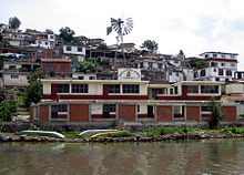 A bilingual Purépecha/Spanish school in the Purépecha community of Janitzio, Michoacán. Since Mexico's 2000 indigenous language law, indigenous languages like Purépecha share the same status as Spanish in the areas in which they are spoken, and many schools offer the curriculum in indigenous languages.