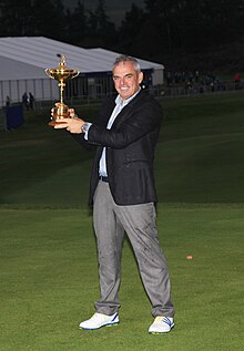 McGinley holding the Ryder Cup trophy in 2014. Ryder Cup - 2014 - Paul McGinley (15360203186).jpg