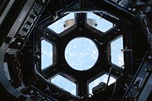 The Cupola's windows with shutters open STS130 cupola view1.jpg