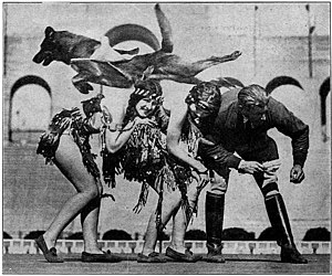 Rin-Tin-Tin, the canine movie star, gives a demonstration of high jumping at the Los Angeles Motion Picture Exposition.