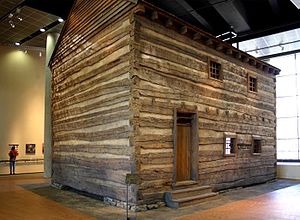 The Slave pen, the principal artifact at the Freedom Center, was transported from its original Kentucky location and reconstructed on the second floor of the Center Slave pen exterior.jpg