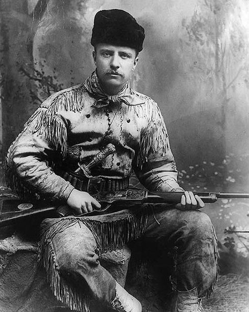 Theodore Roosevelt as Badlands hunter in 1885. New York studio photo.