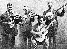 The Skillet Lickers around 1926: from left Gid Tanner, Clayton McMichen, Riley Puckett (seated) and Fate Norris