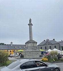 The Octagon Monument was first erected to honour George Clendining in 1845. The present-day statue by sculptor Ken Thompson depicts Saint Patrick and was erected on Saint Patrick's Day 1990. The Octagon Monument with statue of St Patrick.jpg