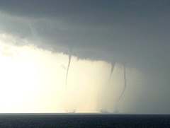 Non-tornadic waterspouts seen from the beach at Kijkduin near The Hague in the Netherlands, 27 August 2006 Three waterspouts Kijkduin.jpg