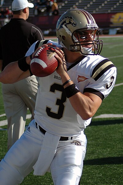 Image: Tim Hiller holding a football