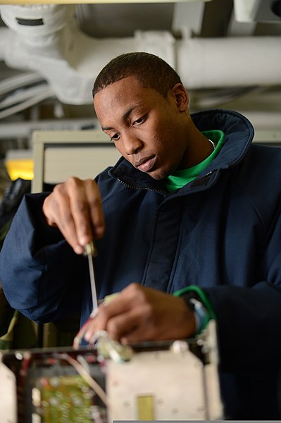 File:U.S. Navy Aviation Electronics Technician Airman Sean Steele troubleshoots a radar transceiver-receiver aboard the aircraft carrier USS John C. Stennis (CVN 74) in the Arabian Sea 130101-N-RJ456-013.jpg