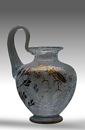 Glass vase with the craquele effect. The cracks are the result of brief but intense stress created when the semi-molten piece is briefly dipped in water. Vase-craquele-Emile-Galle-vers-1880-decor-mante-religieuse-cigale-1301.jpg