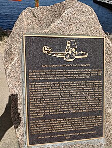 A historical plaque and a sculpture of a Vickers Vedette are installed at the waterfront in Lac du Bonnet, Manitoba. Vickers Vedette Plaque, Lac du Bonnet, Manitoba.jpg