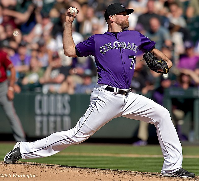 Alternate purple uniform with home white pants, as worn by Wade Davis.