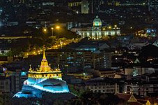 The Golden Mount of Wat Sa Ket Ratchaworamaha Wihan, with Ananta Samakhom Throne Hall in the background, by User:Preecha.MJ