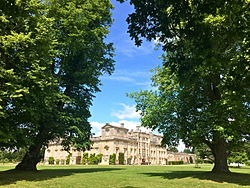 Wilton House framed by trees
