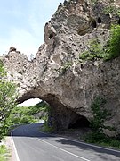 Natural arch near Karahunj village on the Goris-Kapan highway above the river
