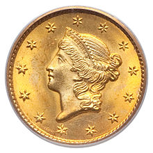 Longacre's design for the Type 1 obverse of the gold dollar is almost identical to his design for the Liberty Head double eagle, only lacking the year of issue, which is on the reverse instead. 1849 G$1 Closed Wreath (obv).jpg