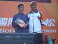 Chin-Wen Ho (left) finally won the champion in Men's 9 km Road Running Group.