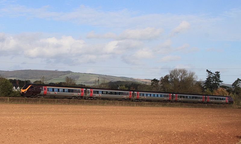 File:Allerford - CrossCountry class 221 down train.JPG