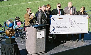 Allen (third from right) and Rutan (fifth from right) were awarded the Ansari X PRIZE by members of the X PRIZE Foundation in November 2004