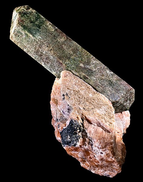 Apatite (CaF) (fluorapatite) doubly-terminated crystal in calcite