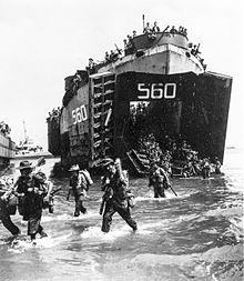 Australian soldiers disembarking from a US Navy LST at Labuan on 10 June 1945 Australian troops land from USS LST-560 at Labuan on 10 June 1945.jpeg