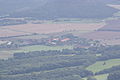 Čeština: Březno (obec Velemín) v pohledu z Milešovky. České středohoří, Česká republika. English: Bžezno village (Velemín municipality) as seen from Milešovka Hill, České středohoří, Czech Republic.