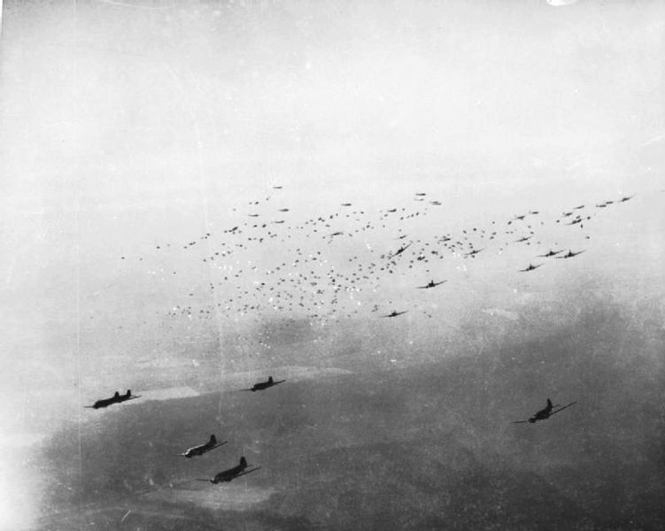 File:C-47 transport planes release hundreds of paratroops.jpg