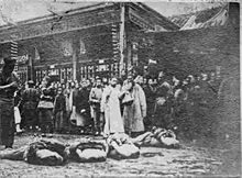 Ranked beheaded bodies on the ground, in Caishikou, Beijing, China, 1905 Caishikou Beheaded Corpses2.jpeg