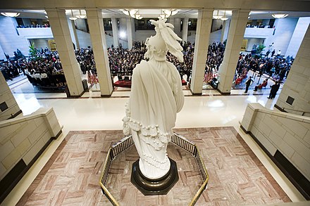 The opening ceremony of the Capitol Visitor Center in December 2008. The plaster cast model of the Statue of Freedom is in the foreground.