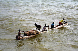 Split log fishing canoe in India