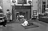 Hanging up stockings for Santa Claus in Worthington, Ohio, 1928 ChristmasEveOhio1928.jpg