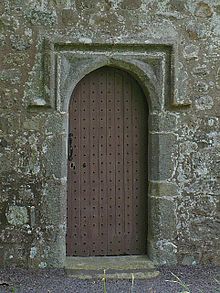 The 15th-century doorway Door of St Cwyllog's Church.jpg