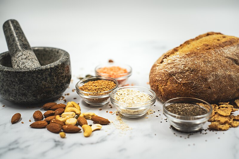 File:Foods with a high fibre content, such as bread, grains, chia seeds and nuts.jpg