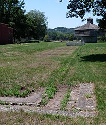 Footings of the first fort can be seen just north of the Villa Louis. The blockhouse in upper right is a reconstruction. Fort Crawford footings.jpg