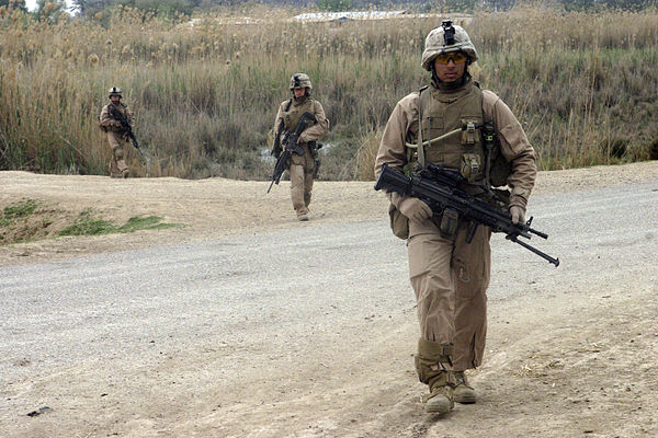 Marines from Company E, 2nd Battalion, 7th Marines patrol in Zaidon, Iraq.