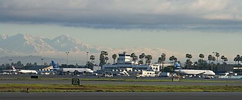 Long Beach Airport with Mount San Antonio and Timber Mountain in the background Home Sweet Home (3158132532).jpg