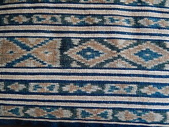 Geometrically patterned Ikat woman's dress of thick cotton. Sumba, mid 20th century Ikat cloth from Sumba, detail.JPG
