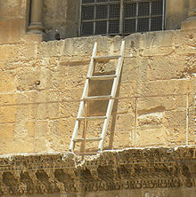 The immovable ladder. Detail from photograph of main entrance above, 2011 Immovable Ladder CotHS.jpg