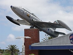 Decommissioned Impala Mk1-PE of the South African Air Force at the entrance to the airport