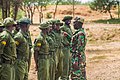 Instructor having a word with Community rangers during a training exercise.jpg