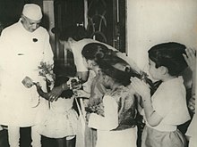 Nehru with schoolchildren at the Durgapur Steel Plant. Durgapur, Rourkela and Bhilai were three integrated steel plants set up under India's Second Five-Year Plan in the late 1950s. Jawaharlal Nehru with school children at Durgapur copy.jpg