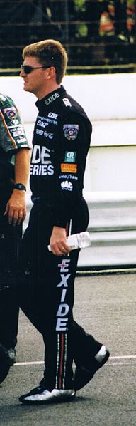 Jeff Burton walks to his car for qualifying at Pocono Raceway in 1998.