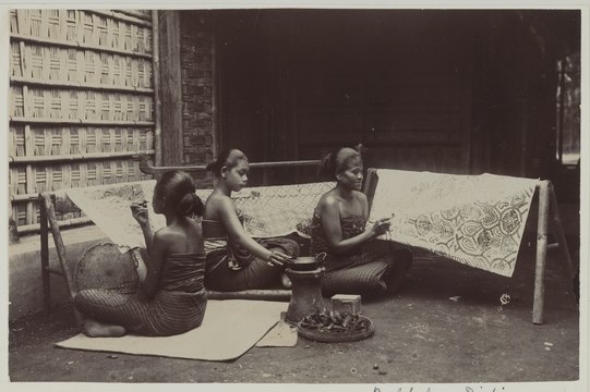 Three young women doing batik at Yogyakarta, c. 1915