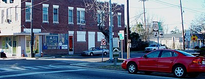 Intersection of LA 1065 (North Cherry Street) and US 190 (East Thomas Street) in Hammond's Historic District: The building in the background is Dantone's Grocery, founded in 1912 by Italian immigrants.
