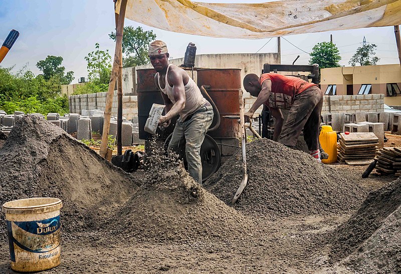 File:Labourers mixing Cement.jpg