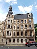 Apartment building in closed development, corner house