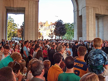 A group of war tourists at the Menin Gate Memorial to the Missing, Belgium