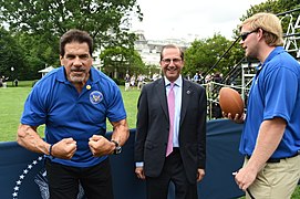 Lou Ferrigno poses with Alex Azar stands in the background.jpg