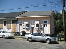 Urban variation of a "dog-trot": Creole cottage row house with narrow dogtrot, New Orleans MiroDogwalkCottagesOct08J.jpg